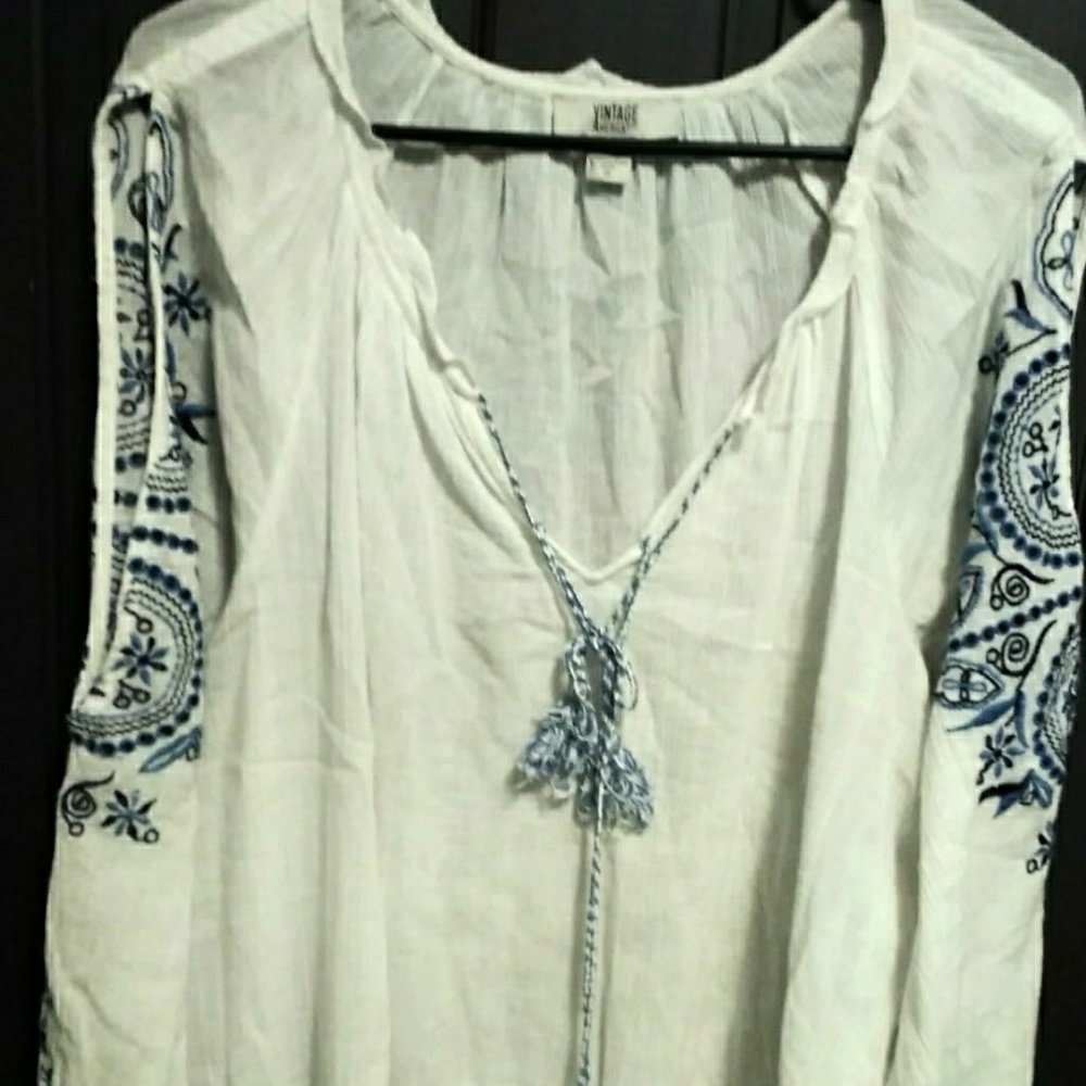 Women's white blouse with blue detail